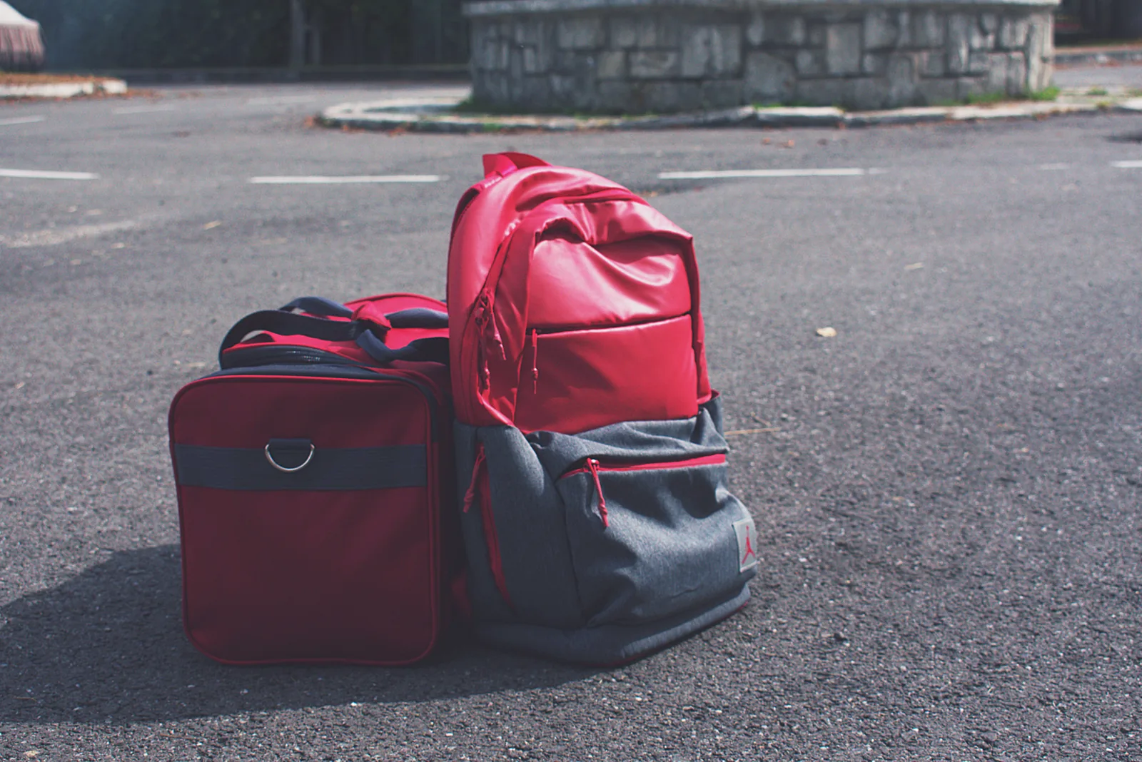underseat bag vs carry on compared side by side in an airport