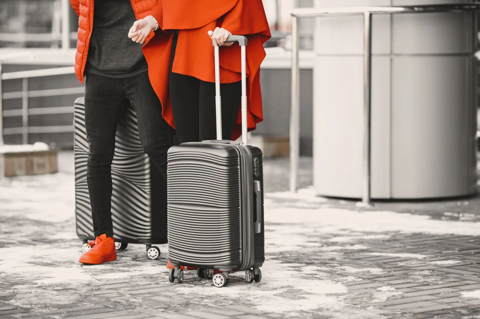 Profile of hardshell and softshell suitcases side by side