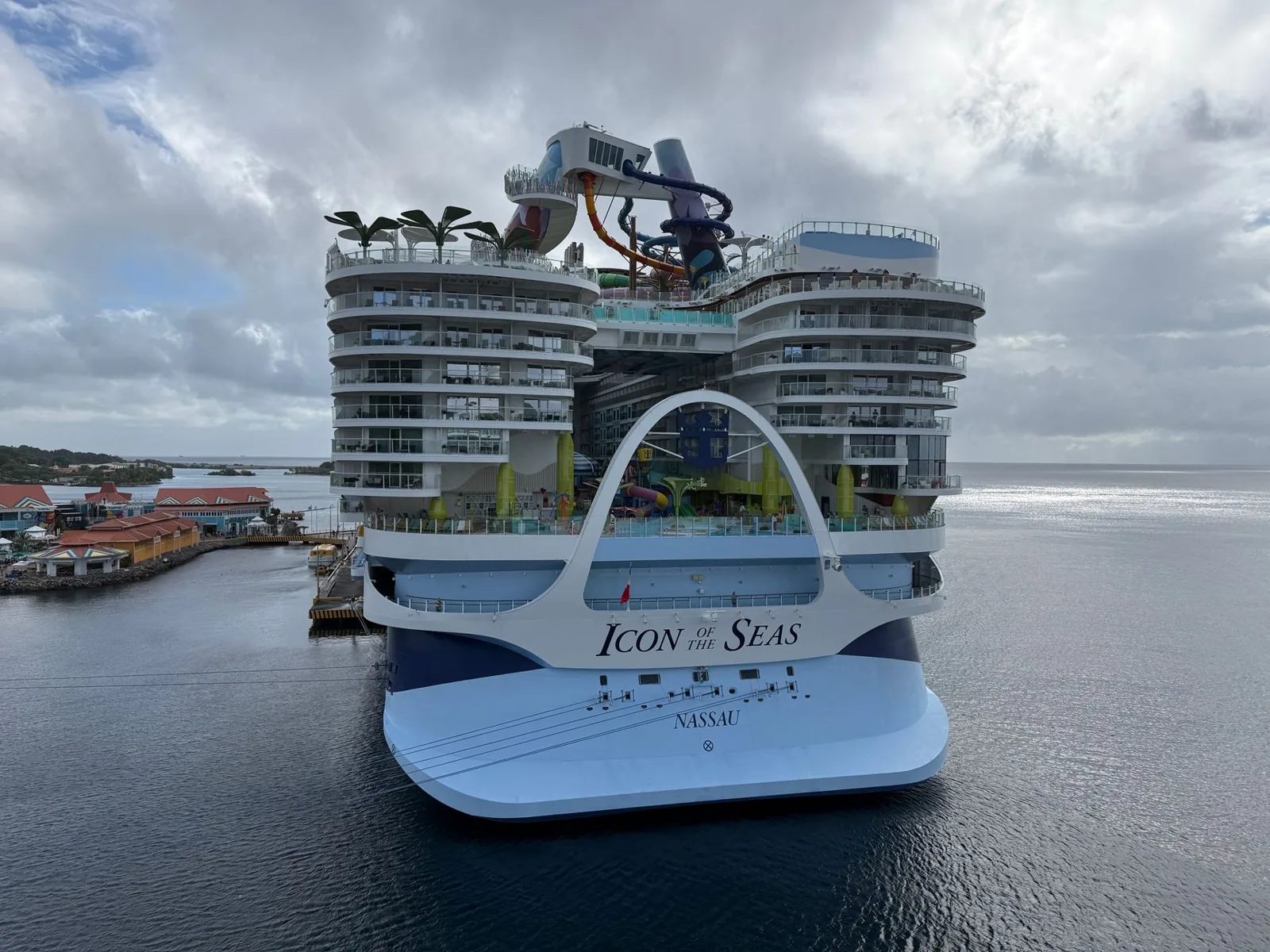 Cruise ship at sea with passengers on deck