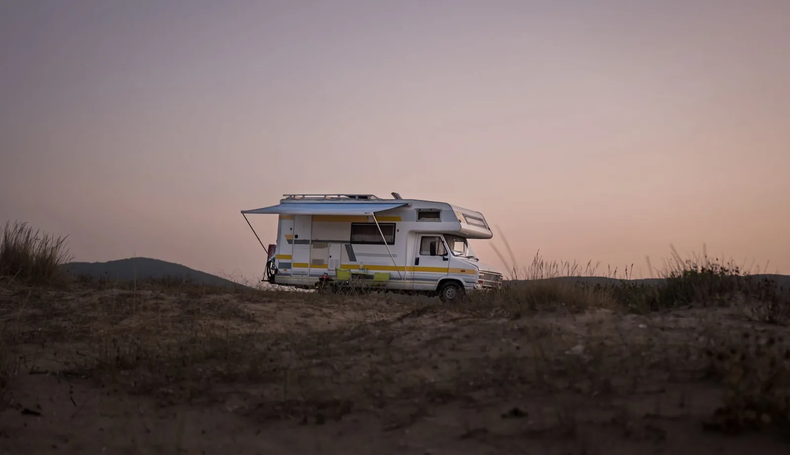 Class C RV cost factors including chassis, length, and slide-outs