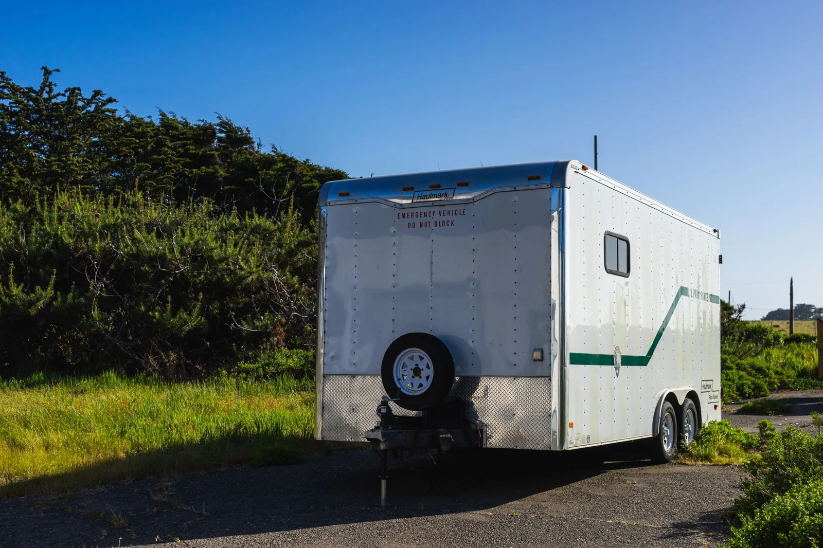 travel trailer parked at a scenic campsite