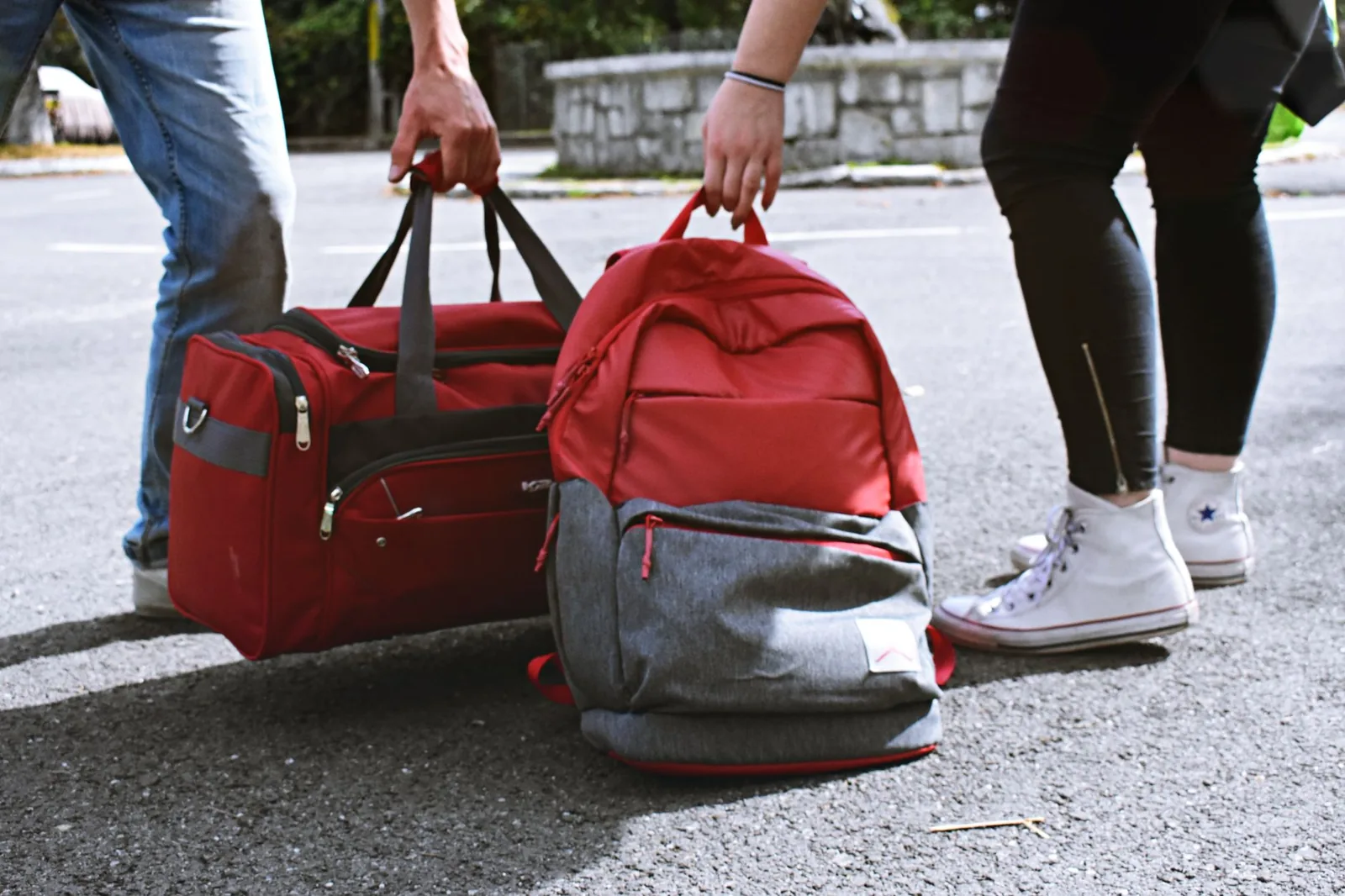 weighing a carry-on bag with a portable luggage scale